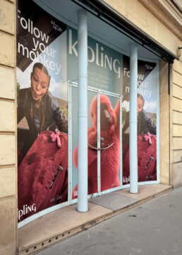 Billboard Premium Wallscapes in Paris Kipling outdoor street campaign X Surface media Haussmann
