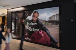 Billboard Premium Wallscapes in Paris Kipling outdoor street campaign X Surface media galleries lafayette