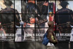 Premium Wallscape on storefront street Ads in Paris