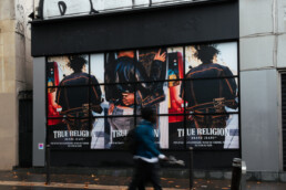 Premium Wallscape on storefront street Ads in Paris